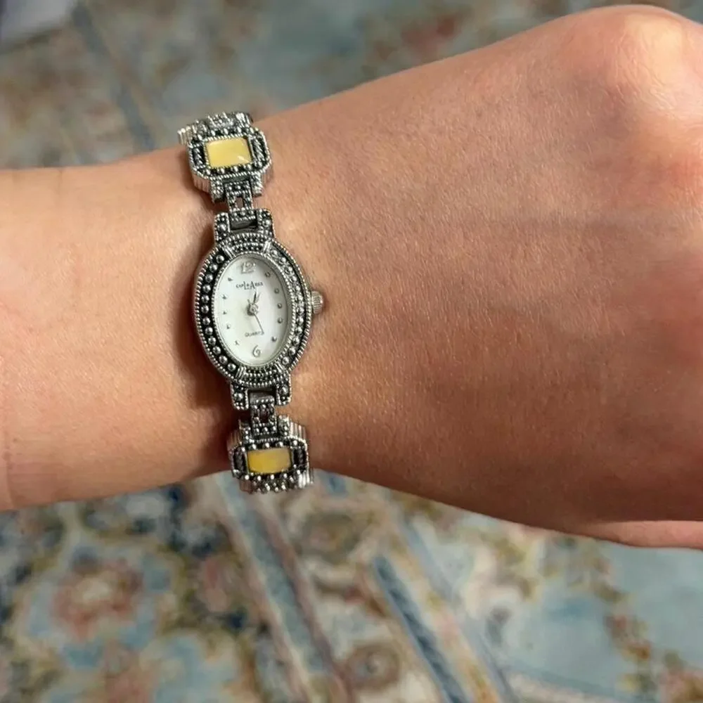 Beautiful silver watch with gold